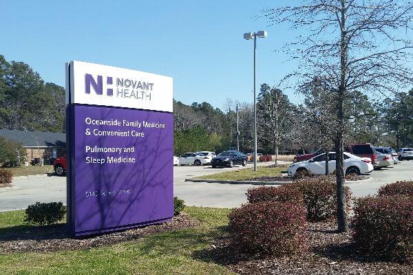 view of Novant sign
